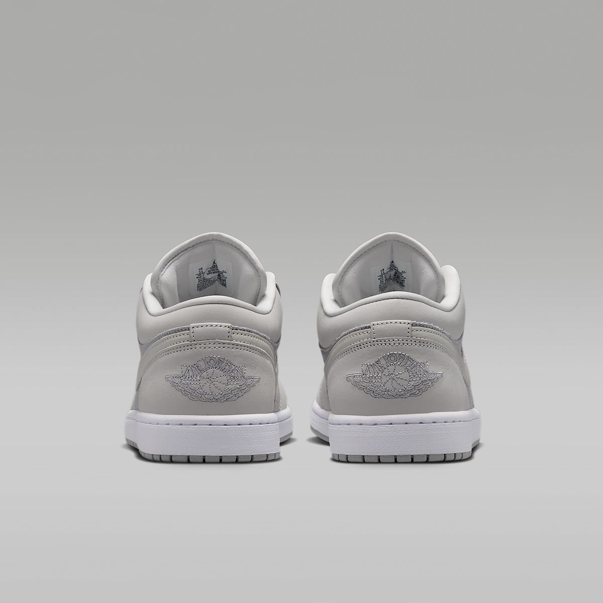 Air Jordan 1 Low SE Off White Soft Pearl Light Smoke Grey Men's - rear view of the pair