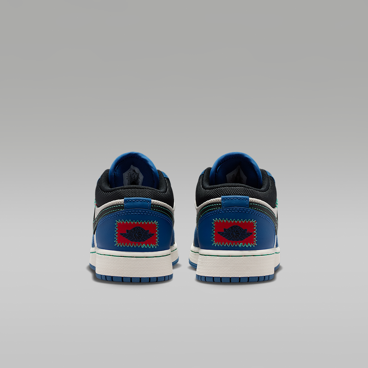 Air Jordan 1 Low SE True Blue University Red Kinetic Green Black Big Kids' - rear view of the pair