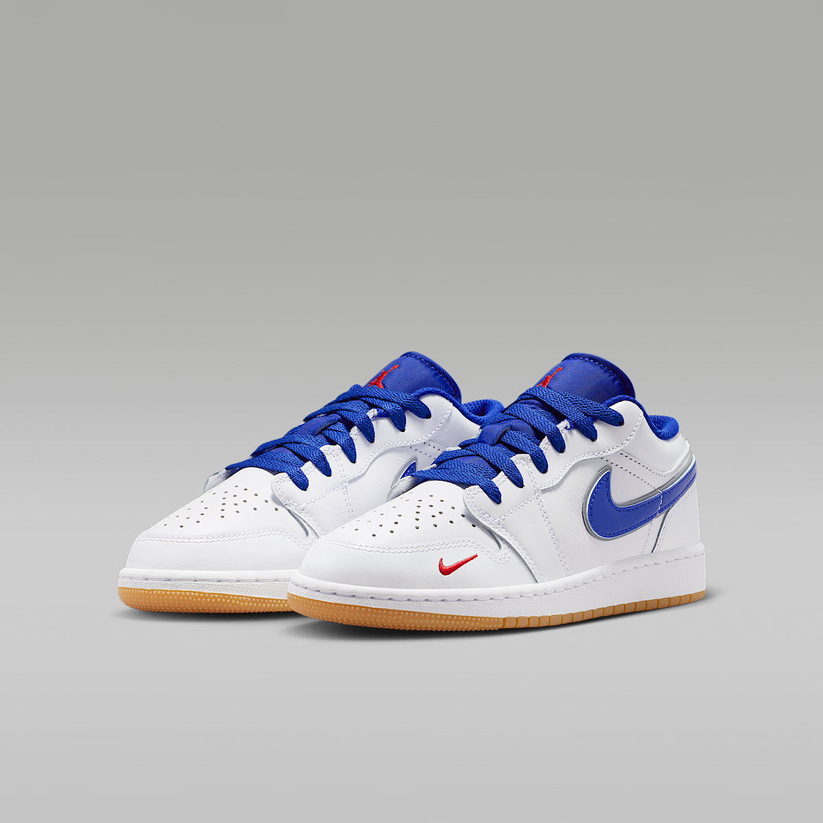 Air Jordan 1 Low SE White Old Royal Gum Yellow University Red Big Kids' - angled view of the pair