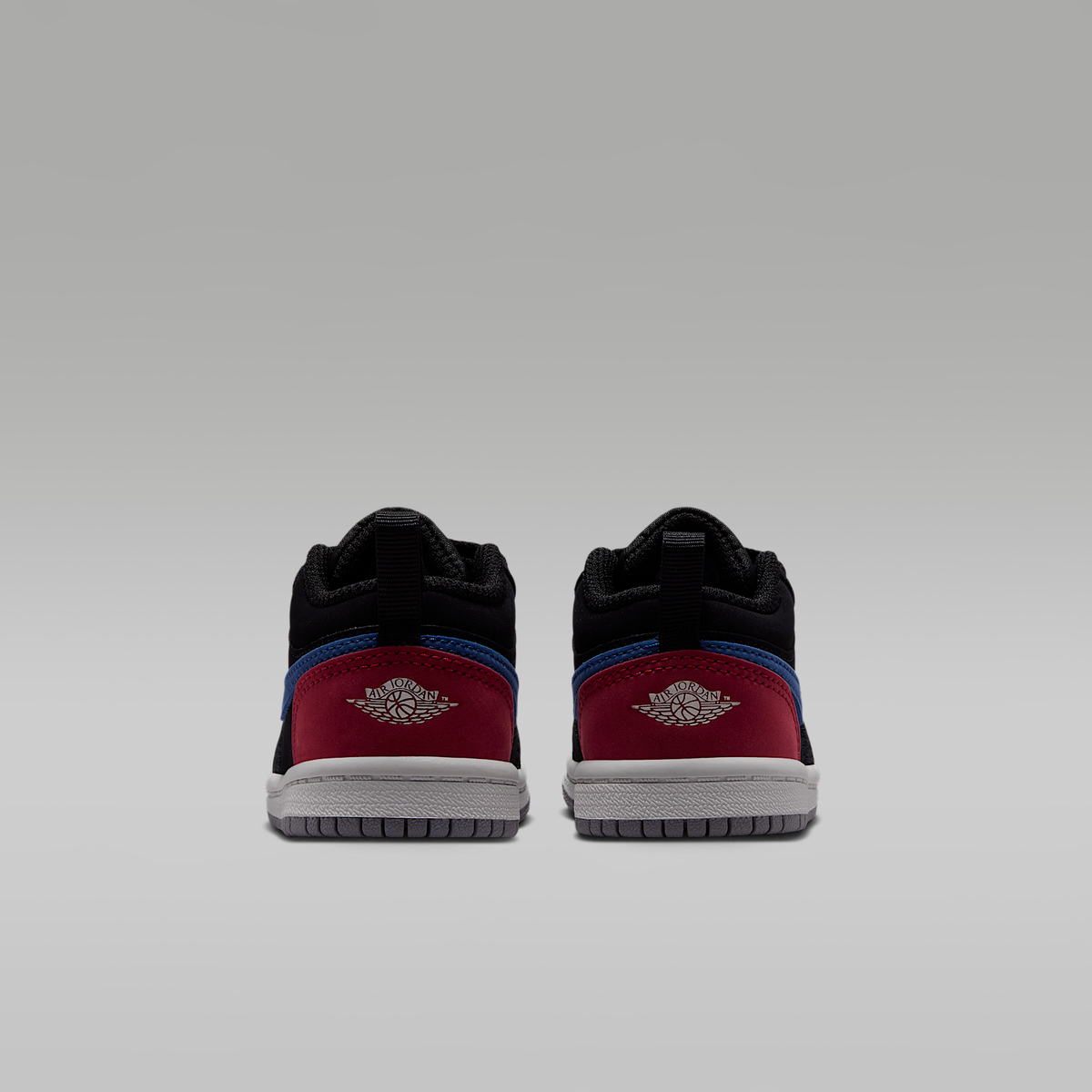 Jordan 1 Low Black True Blue Varsity Red Summit White Baby/Toddler - rear view of the pair