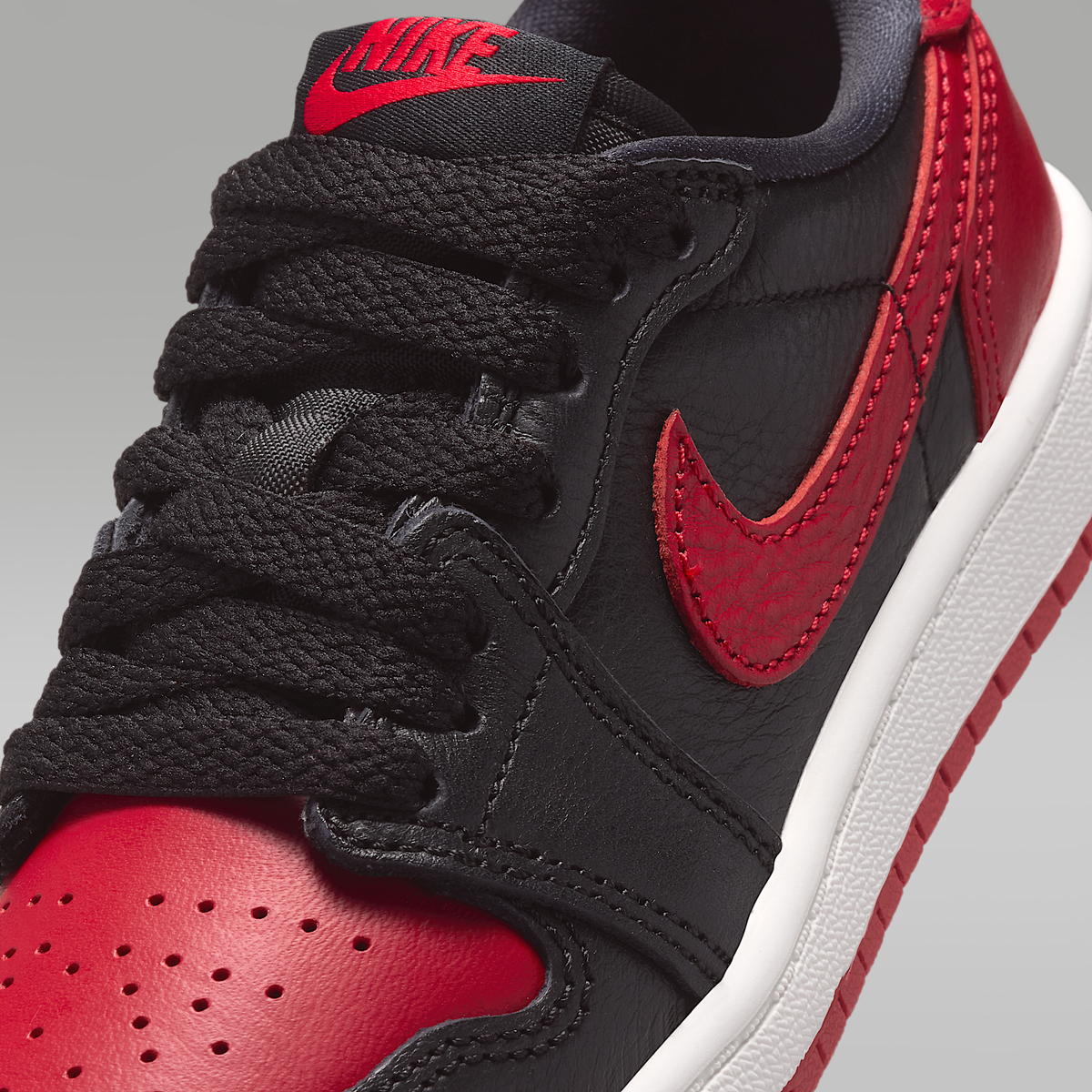 Jordan 1 Retro Low OG "Banned" Black Varsity Red Summit White Black Little Kids' - upper detail
