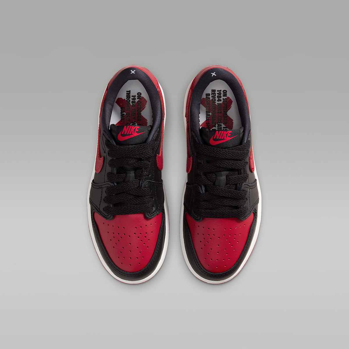 Jordan 1 Retro Low OG "Banned" Black Varsity Red Summit White Black Little Kids' - top view of the pair