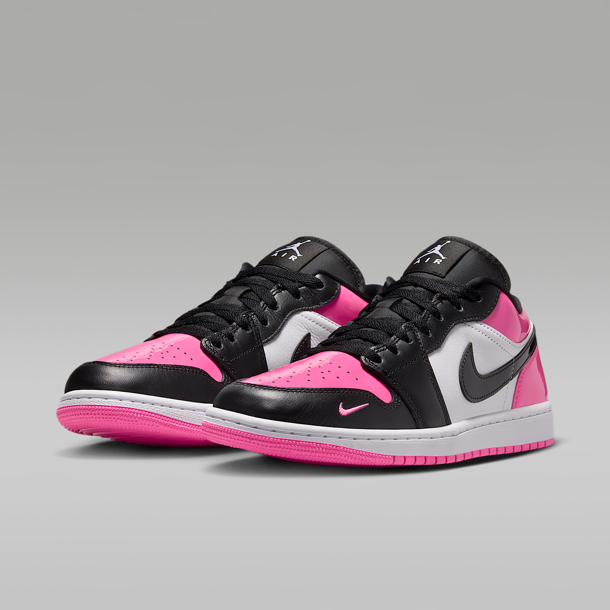 Air Jordan 1 Low SE Pinksicle White Black Women's - angled view of the pair