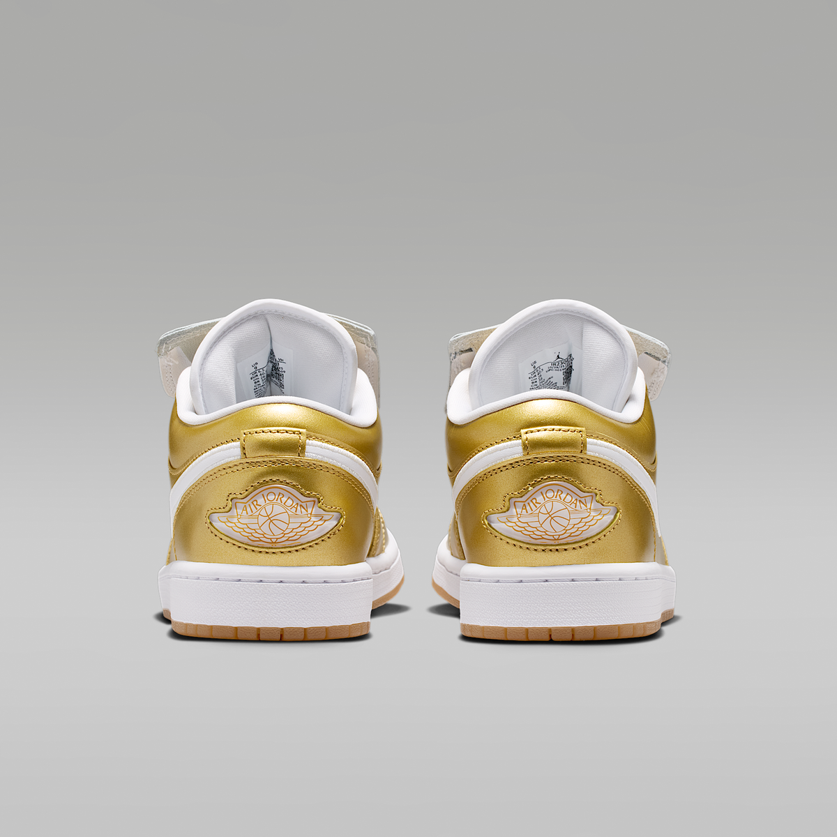 Air Jordan 1 Low Gold White Gum Yellow Gold Women's - rear view of the pair